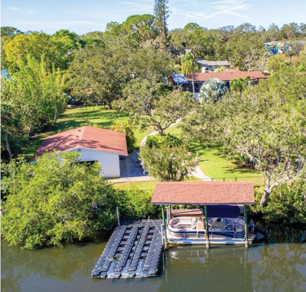 SECLUDED OLD FLORIDA LOT ON PHILLIPPI CREEK With 100 ft of Waterfront